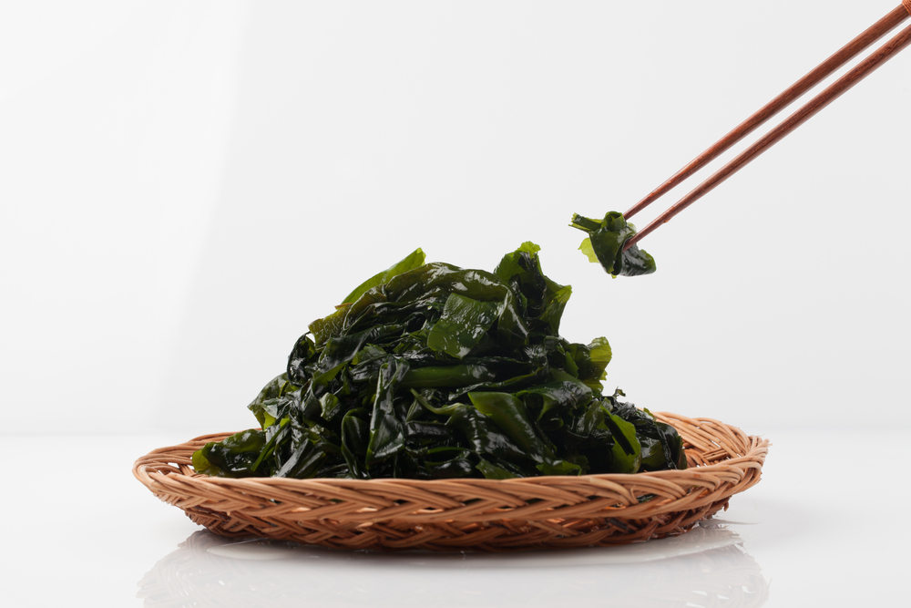 Seaweed on plate with chopsticks